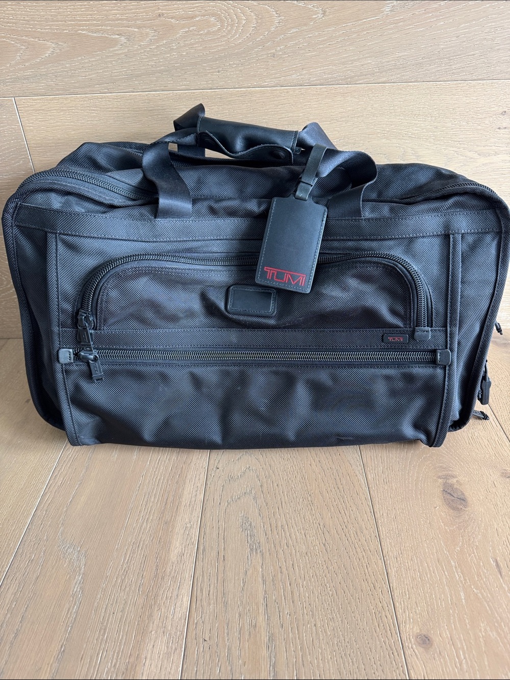 Tumi Black Nylon Duffel Travel Bag with wheels and handle